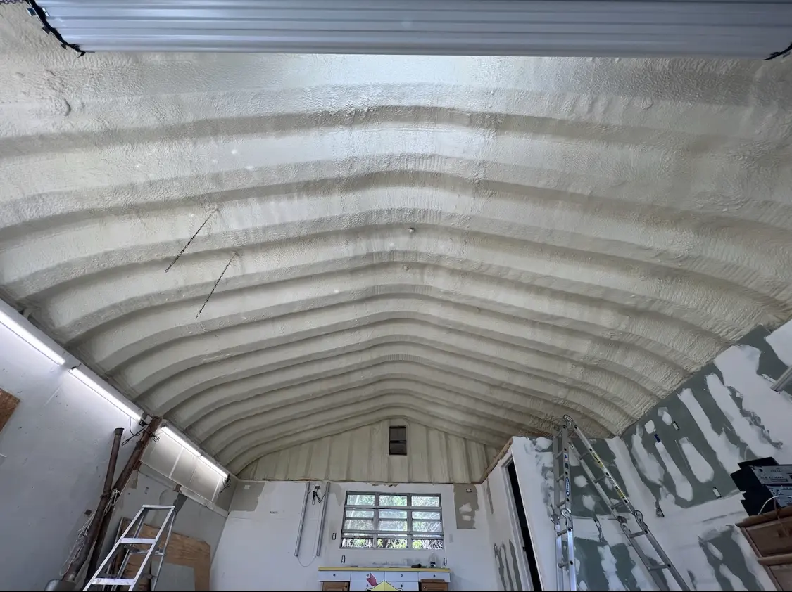 Spray polyurethane foam applied to the underside of a metal roof deck in Mentor-on-the-Lake